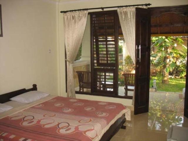 Mandhara Chico Bungalow Lovina Zimmer foto